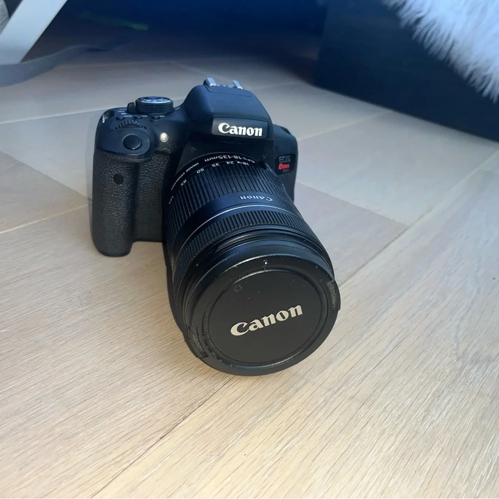 Canon EOS Rebel T6i Digital SLR with EF-S 18-135mm is STM Lens - Wi-Fi Enabled.